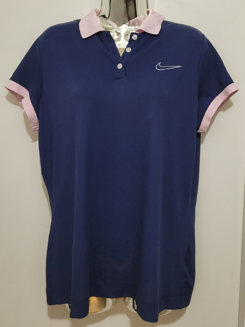 Nike Womenโs Navy Polo with Pink Collar & Sleeve Trim